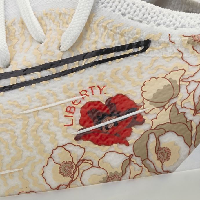 Chaussures De Football Puma Canada X Liberty Ultra Fg-ag Blanc-noir-sun Kiss Femme
